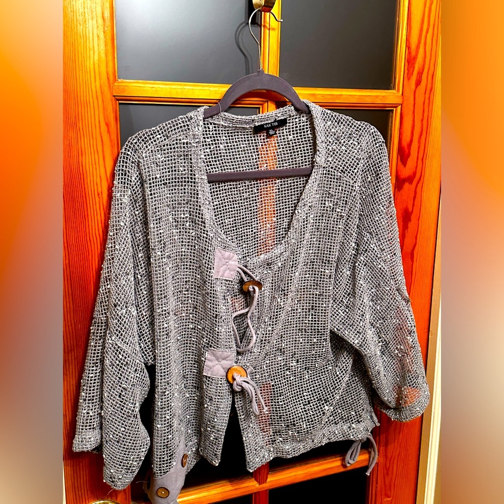 Sweater/ cardigan. Gray and silver.  Buttons of the side.
